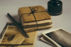 old letters, quill, old photos